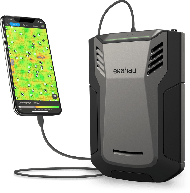 An Ekahau Sidekick tethered to a phone displaying a signal strength heatmap across a floorplan