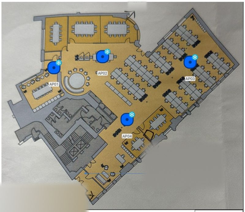 A scaled office floorplan marked with four proposed access point positions